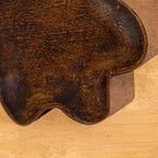 Close-up of the carved surface of the Wavy wooden spoon rest